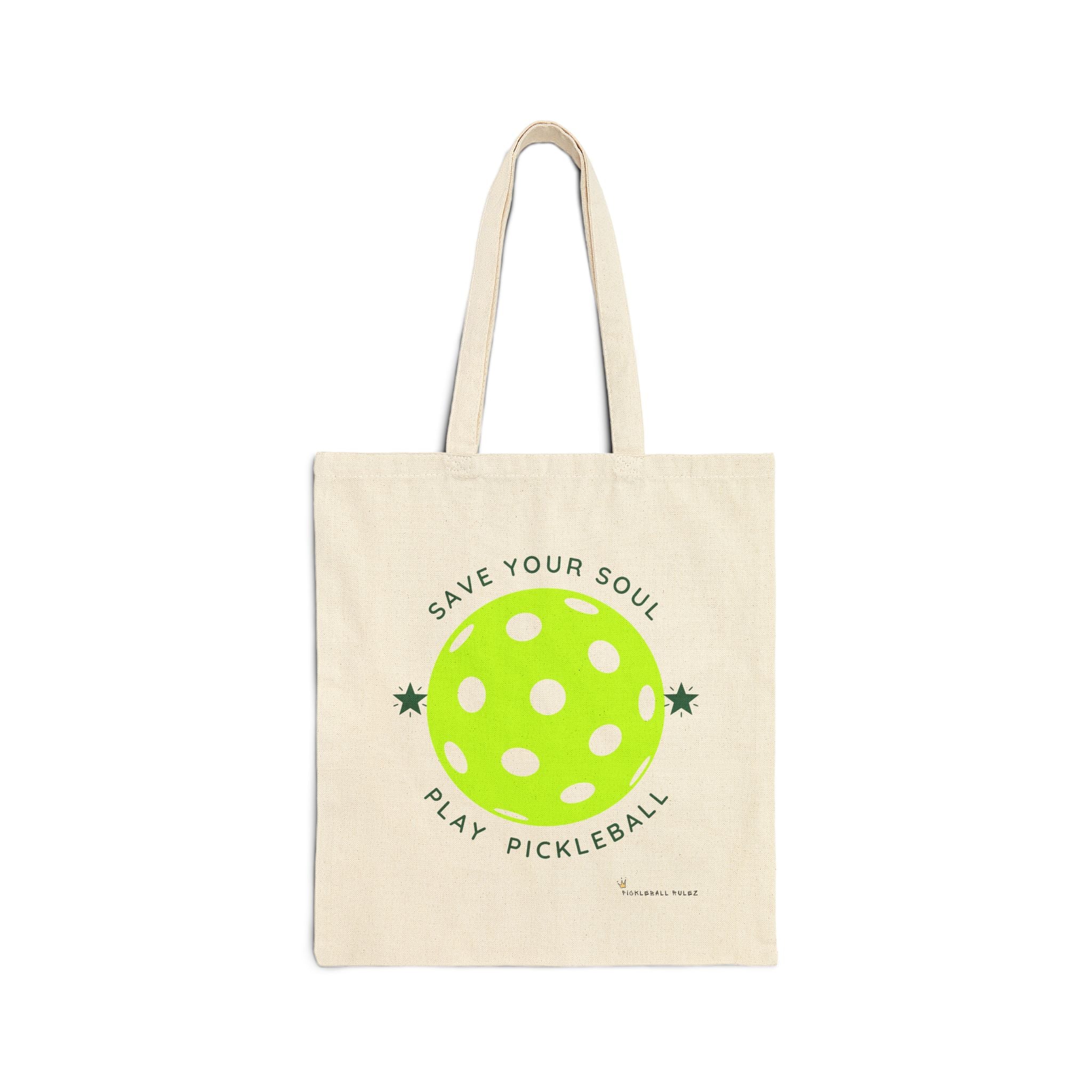 Beige tote bag with a green pickleball graphic and text on a white background
