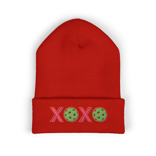 Red beanie with 'XOXO' and cookie designs on a white background