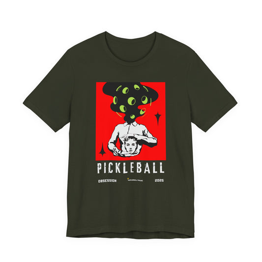 Black t-shirt with a graphic design featuring a pickleball ball and text on a white background