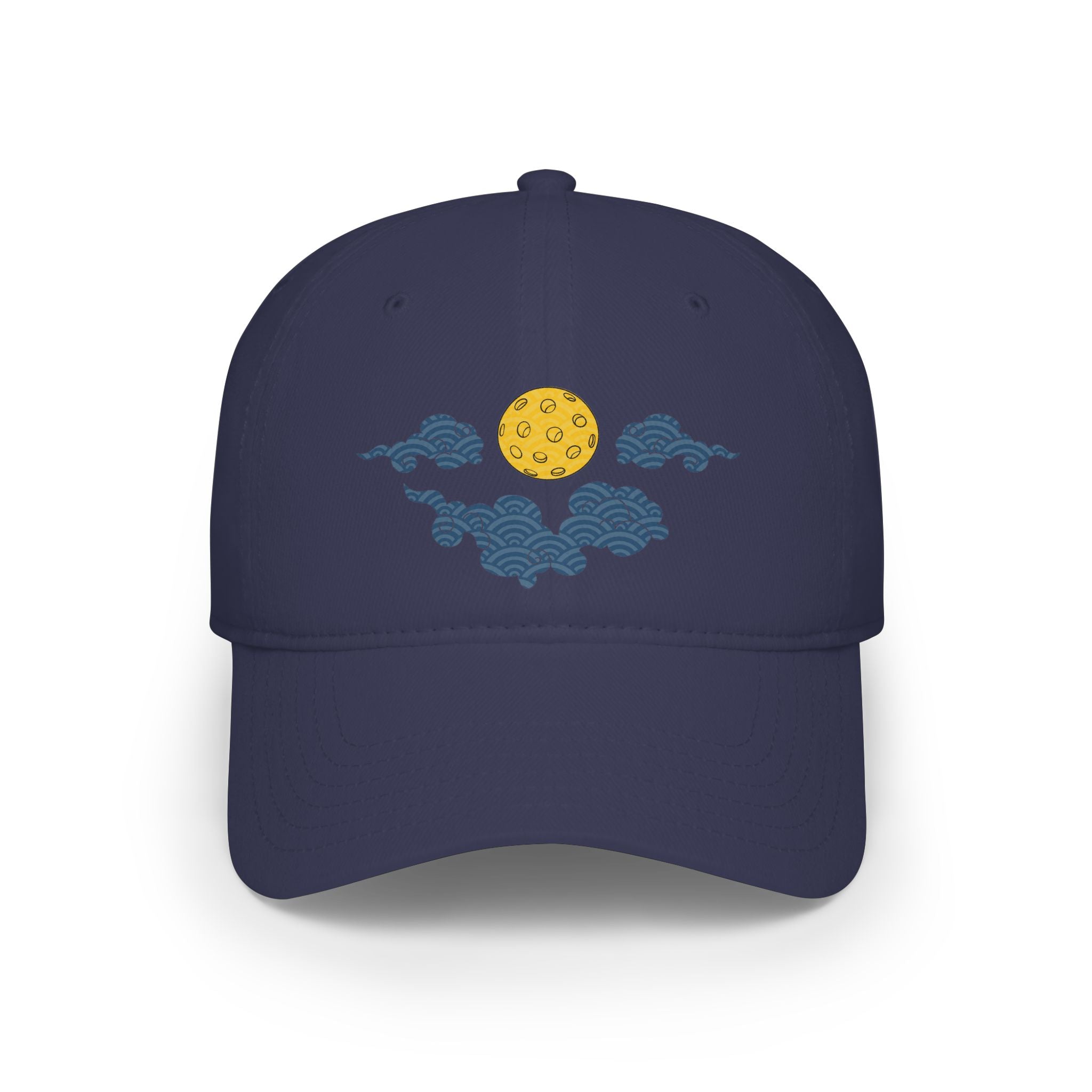 Navy blue cap with embroidered design of a yellow moon and blue waves on a white background