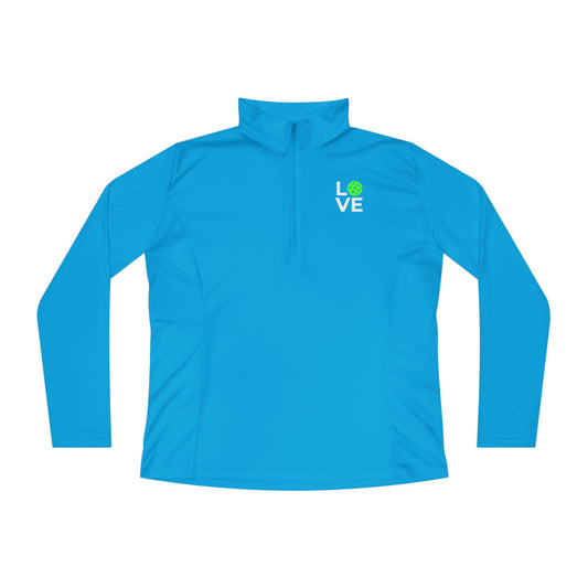 Blue long-sleeve shirt with a green logo on a white background