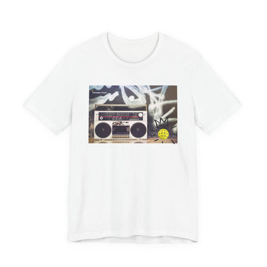 White t-shirt with a graphic of a boombox and crown on a white background
