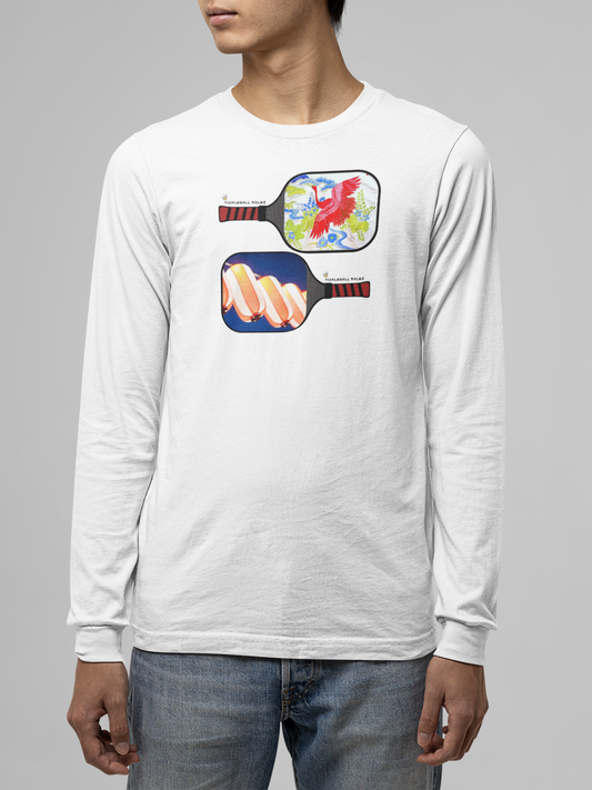 Person wearing a white long-sleeve shirt with pickleball paddle design on a gray background
