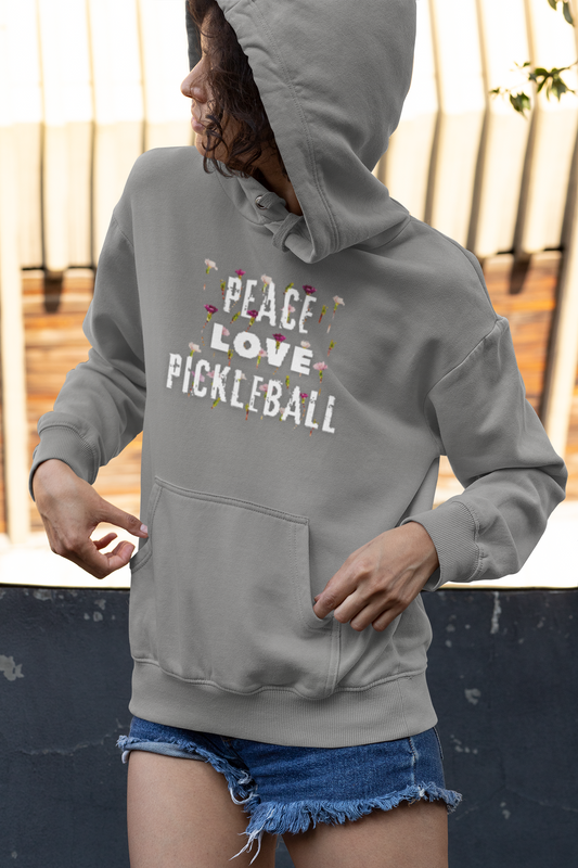 Person wearing a gray hoodie with 'Peace Love Pickleball' text